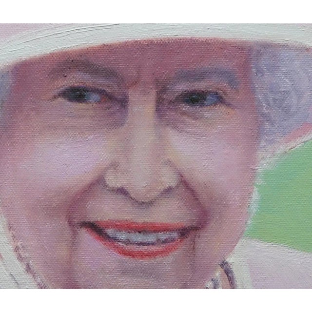 Senior Queen Elizabeth II with light pink hat