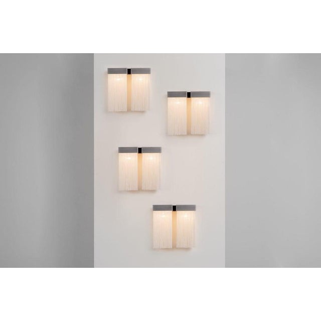 A rare and exquisite set of 259/2 wall lights designed by the legendary Massimo Vignelli for Arteluce in 1964. These...
