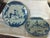 This pair of plates are suitable for wall hangings. They are hand painted in blue and white and depict country buildings....