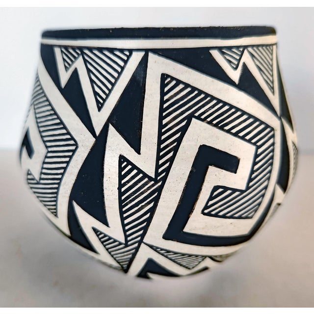 This stunning Native American, Acoma Pueblo bowel, will catch the attention of the well discerned eye. It is signed by...