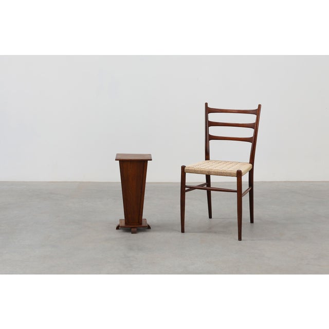 A striking French Art Deco pedestal crafted from solid oak, dating to the 1920s. This elegant display stand embodies the...