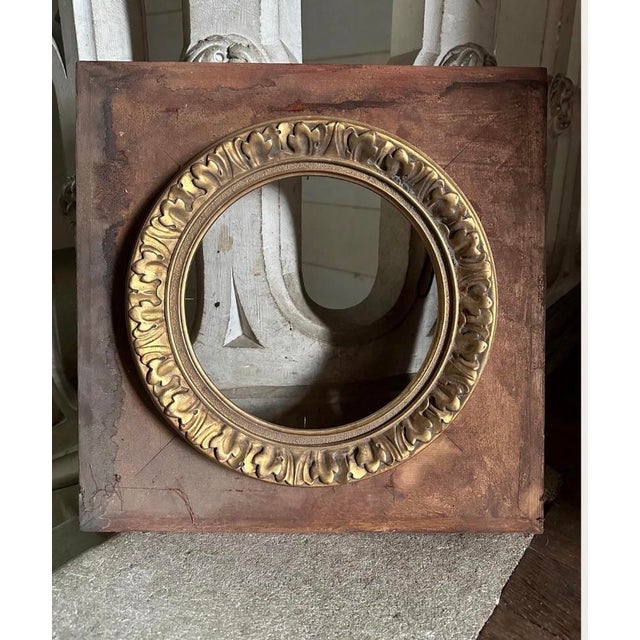 Elegant matching pair of antique French giltwood frames featuring beautifully carved oval openings and scrolling acanthus...