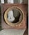 Elegant matching pair of antique French giltwood frames featuring beautifully carved oval openings and scrolling acanthus...