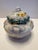 An elegant antique European porcelain covered sugar bowl dating to the late 19th–early 20th century. This finely crafted...
