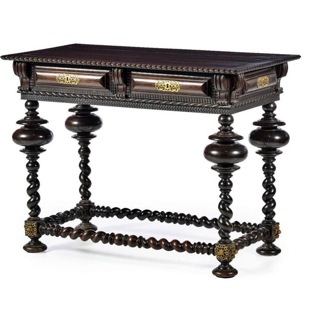 Buffet Table Portuguese, 19th century, made of twisted and trembling mahogany wood. Rectangular top, framed by a trembling...