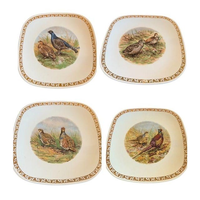 Bring a touch of rustic French elegance to your table with this exquisite set of twelve vintage plates by Longchamp,...