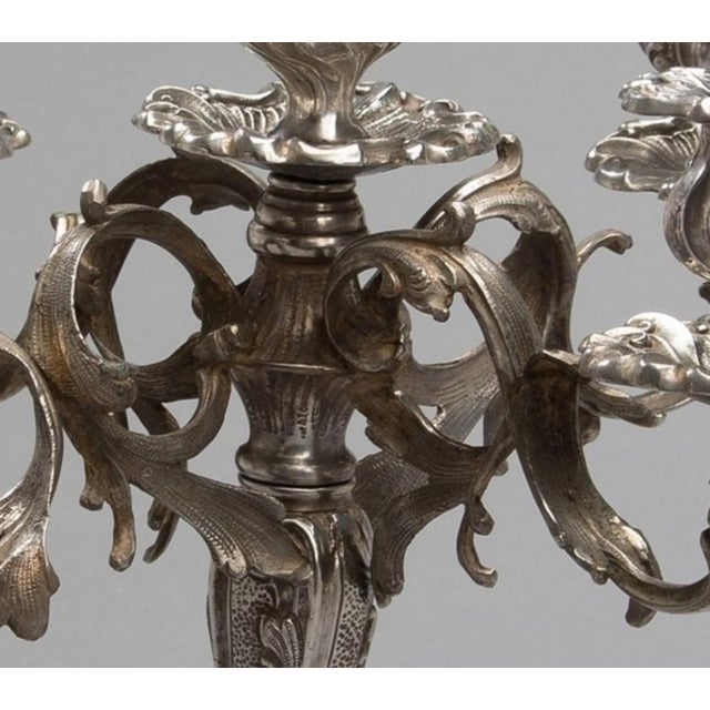 Exceptional fabulous pair of candelabras from the 1800s, in solid silver. In Louis XV style, “Rocaille” decor. Please note...