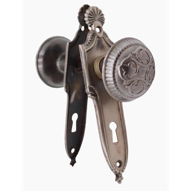 Antique steel passage door knob set. The Vernacular door knobs were made by Russell & Erwin in the 1894 catalog. They are...