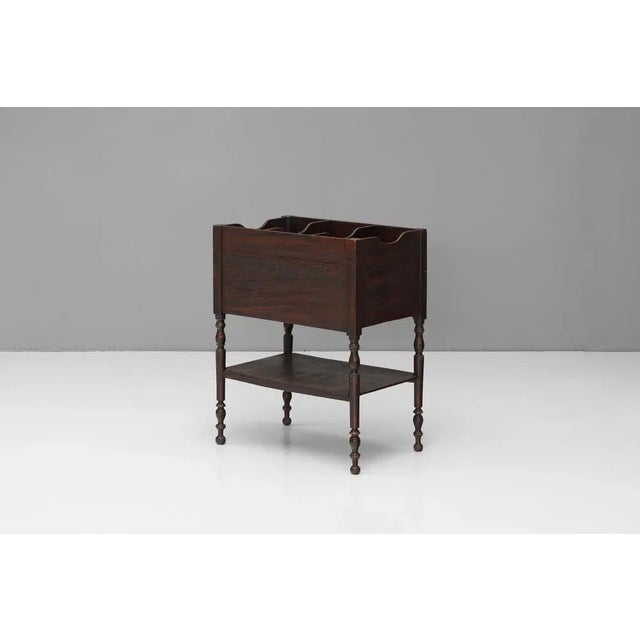 French magazine stand on bobbin turned legs in original paint finish. Circa 1890.