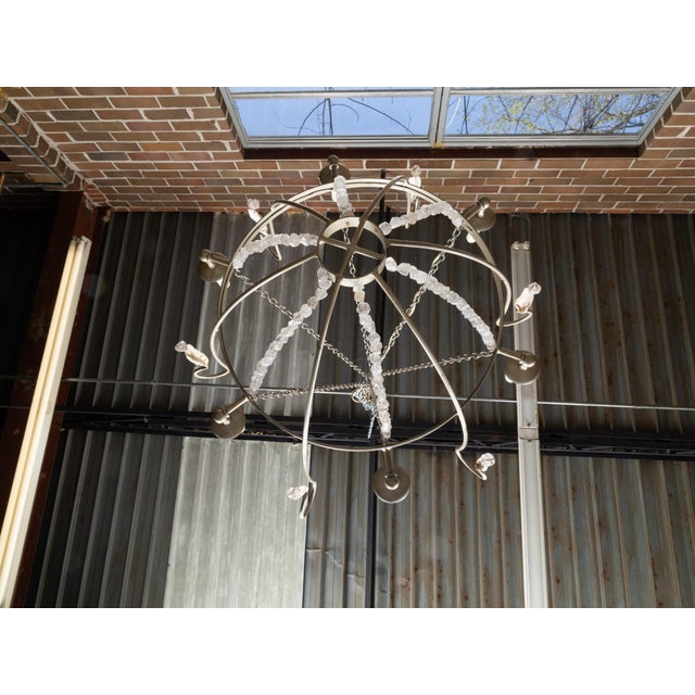 A vintage American six-light rock crystal, oyster basket chandelier, professionally rewired for the USA. This exquisite...