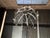 A vintage American six-light rock crystal, oyster basket chandelier, professionally rewired for the USA. This exquisite...