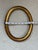 Add a touch of timeless elegance to your art collection or gallery wall with this handsome vintage oval picture frame....