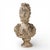 An elegant 19th-century cast stone bust depicting a classical female figure, beautifully modeled with soft, idealized...