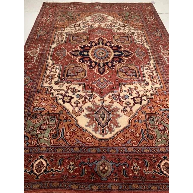 Serapi design rug. Handmade and hand-knotted in fine lambswool on a cotton foundation. Vegetable dyed hand-spun wool rug....