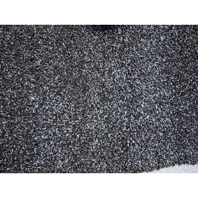 Handmade contemporary French Hooked rug made by One Royal Art, collection 2021. This rug is one of a kind made in France....