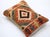 A one-of-a-kind handwoven Afghan wool kilim lumbar pillow featuring concentric diamond medallion. Cut and sewn by hand...