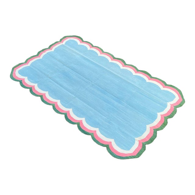 Handmade Cotton Area Scalloped Rug Sky Blue, Cream, Pink and Forest Green Border Dhurrie - 10'x14' For Sale