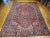 Presenting a truly astonishing piece of Persian craftsmanship, this exceptional vintage Heriz Serapi rug hails from the...