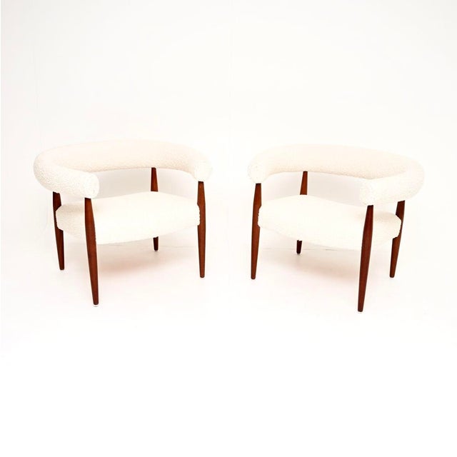 An exceptionally beautiful and very rare original pair of vintage Danish ring chairs by Nanna Ditzel for Kolds Savvaerk....