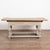 This handsome oak work or refectory table in the Baroque style is from Denmark. The natural oak plank top shows age-...