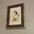 “Enchanted Bird” by Clemence Wescoupe. The art and frame are both in good condition. Framed and matted.
