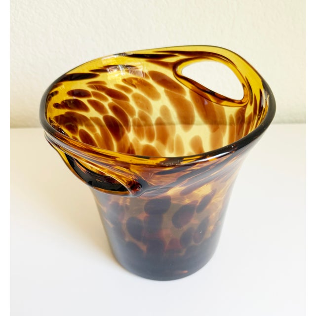 Produced in the 1960s as part of the Dior Home Collection, we present this exquisite blown glass champagne/wine bottle...