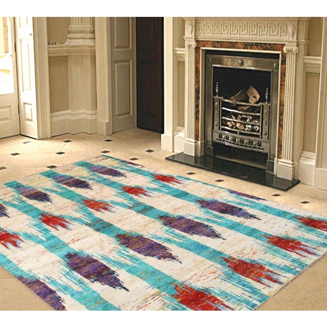 Dress up your floor with fashionable Sari Silk Collections. These beautiful rugs cleverly integrate sari silk dresses,...