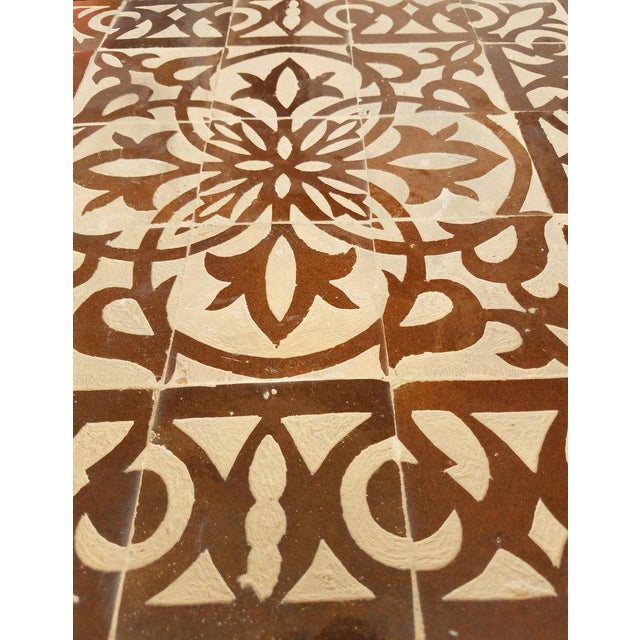 Beautiful brown and natural mosaic tile table. Square shape. An indoor/outdoor table measuring approximately 20" x 20"....