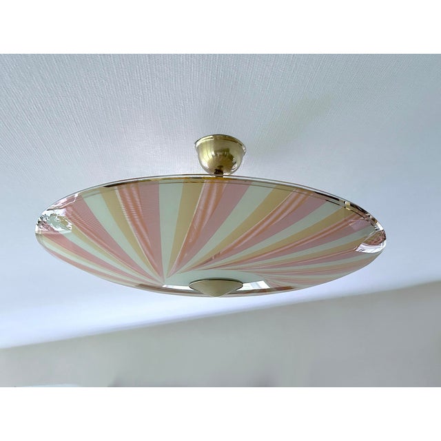 Exceptionnal very large Mid Century pendant light with pastel Pink yellow ivory glass shade in a spiral pattern and gold...
