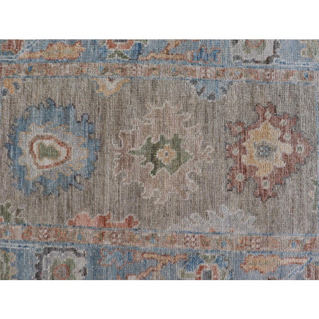 Textile Modern Floral Oushak With Sandy-Brown Background and a Sky Blue Border 2'7" X 4'0" For Sale - Image 7 of 10