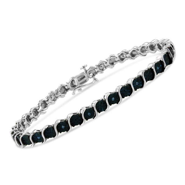 Adorn yourself with this gorgeous diamond tennis bracelet at any event for a touch of classic dazzle and elegance. Crafted...