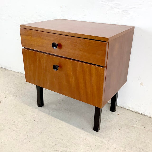 This mid-century nightstand captures the thoughtful simplicity that defined modern design from the era. Crafted with clean...