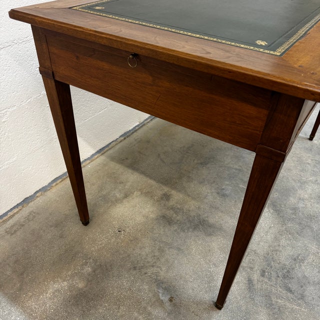 This elegant Louis XVI-inspired flat desk features clean lines and a classic structure that integrates seamlessly into...