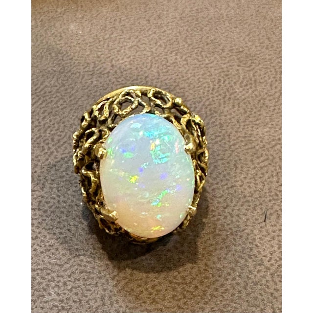 Vintage 11 Carat Oval Shape Ethiopian Opal Cocktail Ring 14kt Yellow Gold Ring For Sale - Image 9 of 18