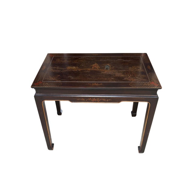 Black Lacquered Asian Chinoiserie side or cocktail table with two sliding trays, by Henredon. In excellent condition. We...