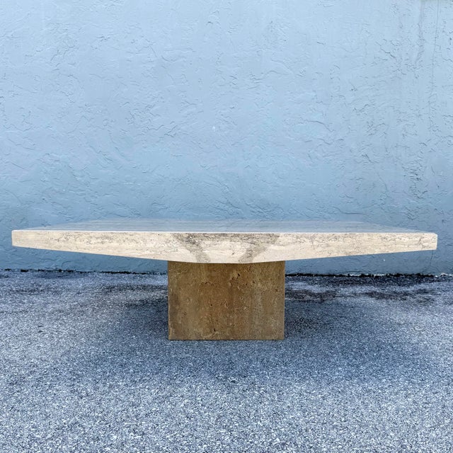 This vintage Italian coffee table makes a bold minimalist statement with its generous square top and sculptural floating...