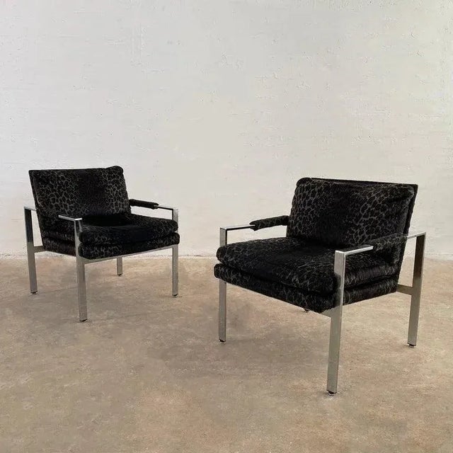 Pair of mid-century modern, lounge chairs by Milo Baughman for Thayer Coggin feature flat bar chrome, cube frames with...