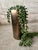 This Haeger cylindrical ceramic vase features a metallic glaze with a rich, reflective surface. The minimalist form and...