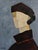 In Ambiguë, French artist Sophie Dumont constructs a portrait through angular planes of cream, ochre and blue-grey. A dark...