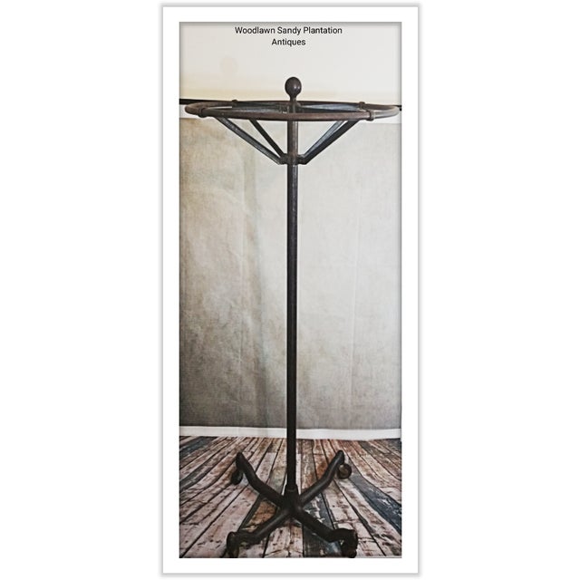 Shop our antique clothes rack selection from the world's finest dealers on 1stdibs. Antique Spinning Solid Cast-Iron Clothing Rack | Chairish