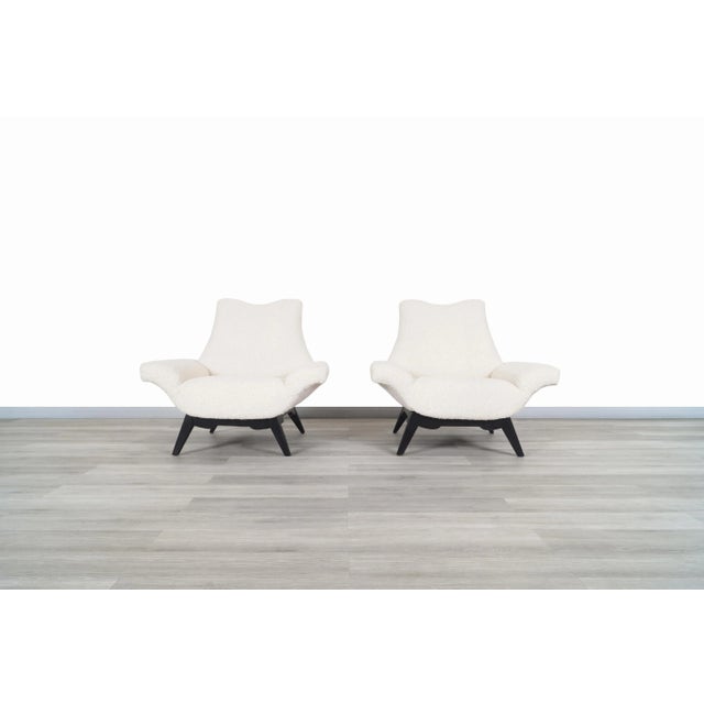 This captivating pair of mid-century modern lounge chairs embodies the expressive sculptural design language that defined...