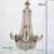 A very beautiful chandelier in the shape of a "hot air balloon" or "beaded bag," made of bronze with crystal beads. It...
