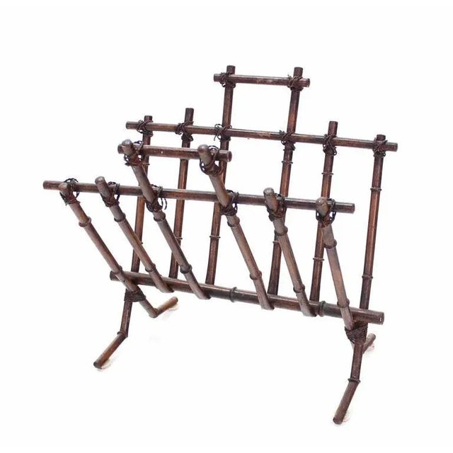 Very nice vintage faux bamboo magazine rack. The piece is from the early 20th century.