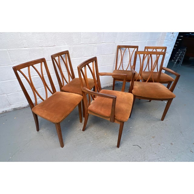Classic mid-century dining chairs by G-Plan. Sleek and minimalist, these chairs combine elegance with everyday comfort,...