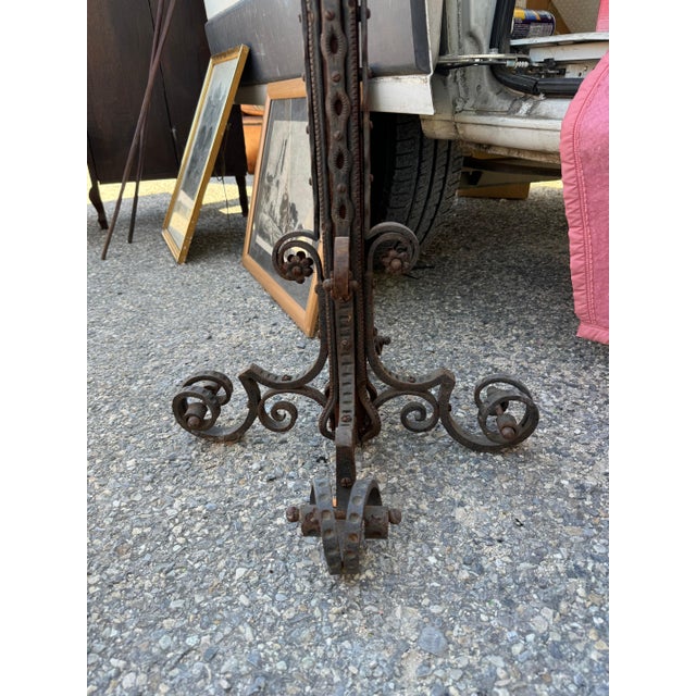French 1920's Art Deco floor lamp. It is completely hand made wrought iron. Newly rewired 60”h to socket base 45-267