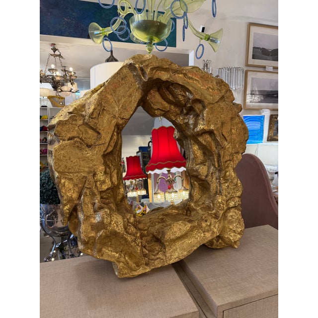 Hand made cave rock formation resin made mirror. Painted a gold gloss finish and can be hung on a wall or resting as...