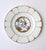A beautiful German hand‑painted white and gold porcelain plate, “Rhododendron,” with an Asian figural scene featuring two...