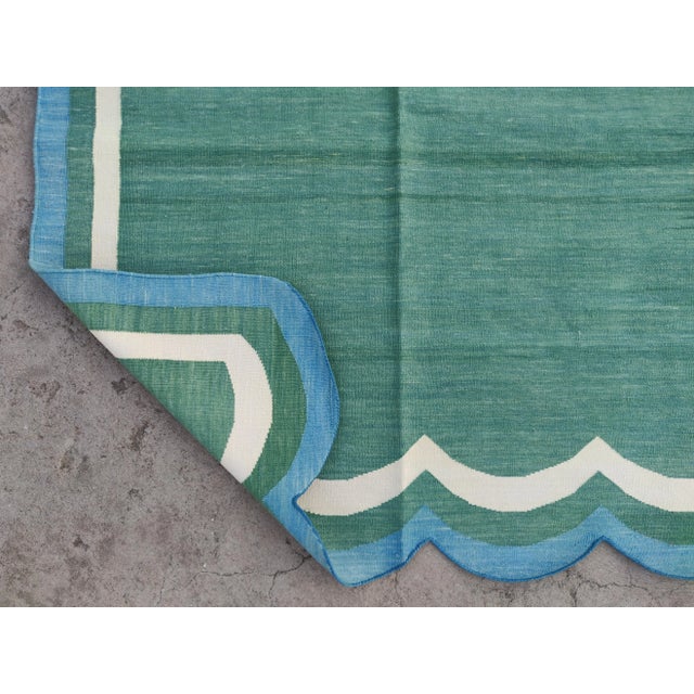 Not Yet Made - Made To Order Handmade Cotton Vegetable Dyed Scalloped Edge Rug in Forest Green With Cream and Teal Blue Border - 8x10 For Sale - Image 5 of 11