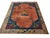 Floral Medallion Rectangle Hand Knotted Pile 1920s Antique Wool Coral Rug, Circa Date: 1920s. This exceptional piece from...