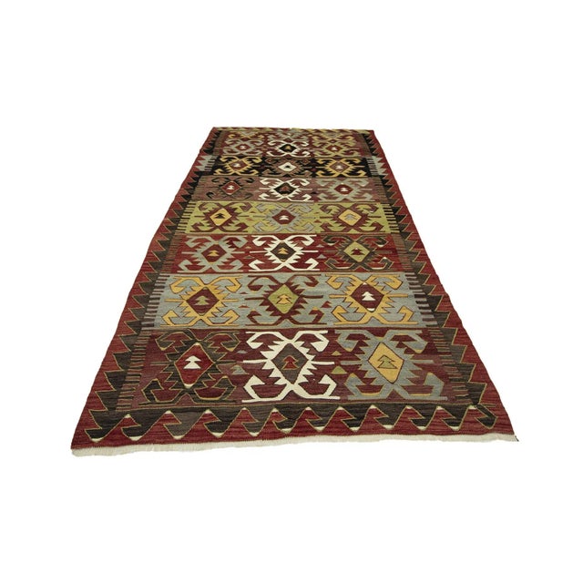 Handwoven vintage kilim rug from Konya region of Turkey. Approximately 50-60 years old. In very good condition.